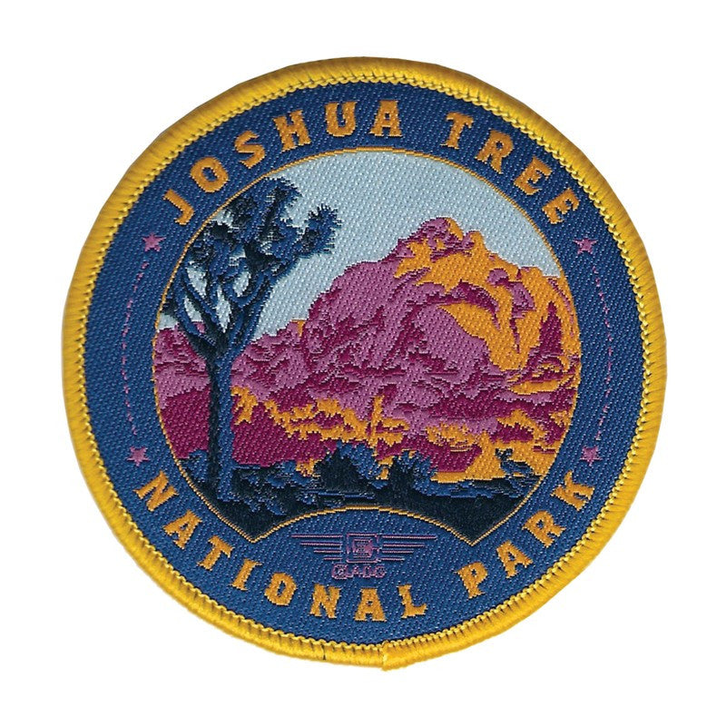 Joshua Tree National Park Woven Patch
A Joshua Tree stands tall amongst rock ridges and massive boulders.
Our durable iron-on woven patches are long-lasting and retain their vibrant, colorful design over time and wear. Bleach-resistant for a professional look and feel.
2.5” x 2.5”